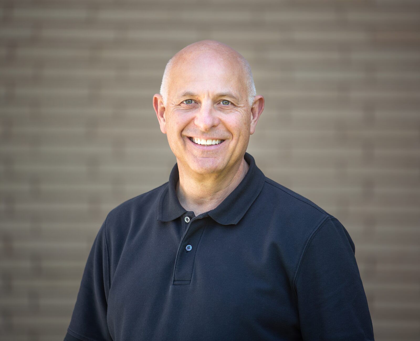 Portrait of Greg Gorgone, founder of Sylva, smiling.